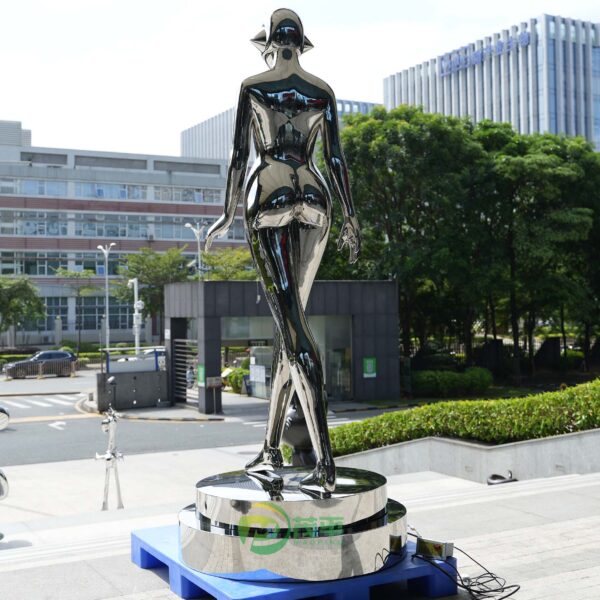 Revolving Light Female Robot Stainless Steel Sculpture - Image 2