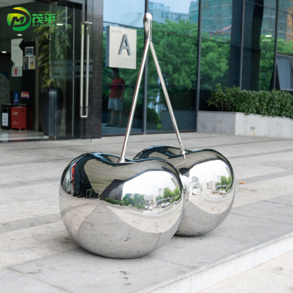 Polished cherry stainless steel sculpture - Image 2